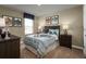 The bedroom features a Hogwarts themed bed, two side tables, carpet flooring, and natural light at 514 Eagle Landing Blvd, Winter Haven, FL 33880