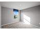 Bright bedroom featuring neutral walls, plush carpet and a window with blue valance at 514 Eagle Landing Blvd, Winter Haven, FL 33880