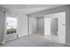 Spacious bedroom featuring a large window for natural light and an ensuite bathroom at 514 Eagle Landing Blvd, Winter Haven, FL 33880