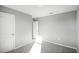 Spacious bedroom with plush carpet and neutral walls, offering a flexible layout at 514 Eagle Landing Blvd, Winter Haven, FL 33880