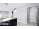 Open floor plan with kitchen island and view of the living room at 514 Eagle Landing Blvd, Winter Haven, FL 33880