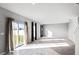 Bright living room featuring carpet floors, and large sliding glass door at 514 Eagle Landing Blvd, Winter Haven, FL 33880