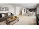 Open-concept living space with staircase, connecting to the kitchen and dining area at 514 Eagle Landing Blvd, Winter Haven, FL 33880