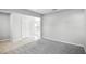 Bright living room featuring neutral colored walls, tile floors, and carpet at 514 Eagle Landing Blvd, Winter Haven, FL 33880