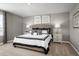 Comfortable main bedroom with neutral color palette, complemented by stylish decor at 514 Eagle Landing Blvd, Winter Haven, FL 33880