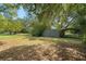 Backyard features a storage shed and car port, and plenty of room for activities at 632 Tildenville School Rd, Winter Garden, FL 34787