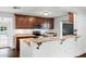 Kitchen featuring granite countertops, custom cabinets, and stainless steel appliances at 632 Tildenville School Rd, Winter Garden, FL 34787