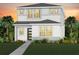 Two-story house with light gray siding, landscaped lawn, and walkway at 6935 Copperwood Ave, Orlando, FL 32829