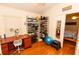 This bedroom features a desk, shoe racks, and access to another bedroom at 742 Seneca Meadows Rd, Winter Springs, FL 32708