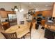 Bright, open-concept kitchen with island, stainless appliances and a connected eating area at 742 Seneca Meadows Rd, Winter Springs, FL 32708