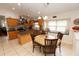 Bright kitchen with stainless steel appliances, center island, and breakfast nook at 742 Seneca Meadows Rd, Winter Springs, FL 32708