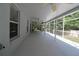Spacious screened-in lanai with ceiling fans, offering an ideal outdoor living space at 742 Seneca Meadows Rd, Winter Springs, FL 32708