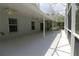 Large screened-in patio features ceiling fans and access to the backyard, perfect for entertaining at 742 Seneca Meadows Rd, Winter Springs, FL 32708