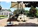 Community playground with a slide and shade cover, offering a safe and enjoyable space for  at 742 Seneca Meadows Rd, Winter Springs, FL 32708