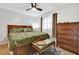 Inviting bedroom with a large window, ceiling fan, and a neutral color scheme at 783 Cornelia Ct, Orlando, FL 32811