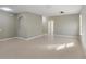 Spacious living room with tile floors and neutral paint at 8008 Page Ct, Haines City, FL 33844