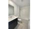 Bathroom with single vanity, tub, and shower at 1148 Pomelo St, Davenport, FL 33837
