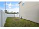 Fenced backyard featuring lush green grass and plenty of open space at 11842 Sunsail Ave, Orlando, FL 32832