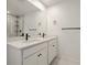 Modern bathroom with double vanity sinks, quartz countertop, and contemporary fixtures at 11842 Sunsail Ave, Orlando, FL 32832