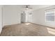 Large, sunny bedroom with carpet and neutral walls offering a versatile space at 11842 Sunsail Ave, Orlando, FL 32832