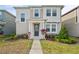 Charming two-story home with well-manicured landscaping and a welcoming walkway at 11842 Sunsail Ave, Orlando, FL 32832