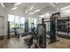 Community gym featuring modern fitness equipment, bright windows, and a spacious layout at 11842 Sunsail Ave, Orlando, FL 32832