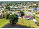 Aerial view of a home, showing property lines and beautiful lake view at 119 Floral Ct, Kissimmee, FL 34743