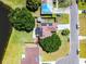 Aerial view of home showcasing solar panels, a large yard, and beautiful views at 119 Floral Ct, Kissimmee, FL 34743