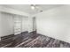 Bedroom with built in storage, laminate flooring, and ample natural light at 119 Floral Ct, Kissimmee, FL 34743