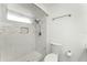 Shower features white tile, a built-in niche, and a handheld shower head at 119 Floral Ct, Kissimmee, FL 34743