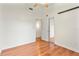 Bedroom with wood flooring, closet and an entrance to another room at 1221 Thunder Trl, Maitland, FL 32751
