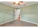 Bedroom with neutral tile flooring and light green painted walls at 1221 Thunder Trl, Maitland, FL 32751