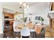 Inviting dining area adjoining the kitchen, with modern lighting and a seamless flow for entertaining guests at 1221 Thunder Trl, Maitland, FL 32751