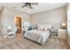 Bright bedroom with a comfy bed, a desk, and an ensuite bathroom providing a private retreat at 15138 Shonan Gold Dr, Winter Garden, FL 34787