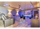 Enjoy movies in this home theater with tiered seating, a large screen, and professional sound system at 15138 Shonan Gold Dr, Winter Garden, FL 34787