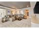 A cozy living room features plush seating, neutral tones, and stylish decor for comfortable living at 15138 Shonan Gold Dr, Winter Garden, FL 34787