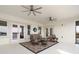 Covered patio with comfortable seating and scenic water views perfect for relaxation and entertaining at 15138 Shonan Gold Dr, Winter Garden, FL 34787