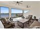 Covered patio with comfortable seating and scenic water views perfect for relaxation and entertaining at 15138 Shonan Gold Dr, Winter Garden, FL 34787