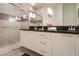 Modern bathroom with double vanity and walk-in shower at 1534 Tranquil Ave, Clermont, FL 34714