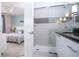 Bathroom with walk-in shower and modern vanity at 1534 Tranquil Ave, Clermont, FL 34714