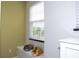 Bedroom features a window seat and built in storage at 1534 Tranquil Ave, Clermont, FL 34714