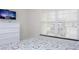 Bedroom with a queen bed and white dresser at 1534 Tranquil Ave, Clermont, FL 34714