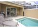 Relaxing pool area with patio furniture and private pool at 1534 Tranquil Ave, Clermont, FL 34714