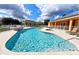 Community pool with hot tub and lounge chairs at 1534 Tranquil Ave, Clermont, FL 34714