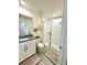 Bathroom featuring a glass enclosed shower, a white vanity and tile flooring at 1700 Tropical Palms Cir, Kissimmee, FL 34747