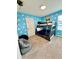 Toy Story-themed bedroom featuring a gray bunk bed, bean bag chairs and carpeted flooring at 1700 Tropical Palms Cir, Kissimmee, FL 34747