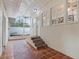 Back porch with brick flooring, steps leading to the backyard at 2004 Magnolia Ave, Sanford, FL 32771