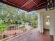 Charming tiled balcony offering neighborhood views, with a decorative awning providing shade at 2004 Magnolia Ave, Sanford, FL 32771