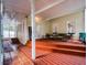Large back porch featuring brick and wood flooring, seating area at 2004 Magnolia Ave, Sanford, FL 32771