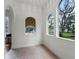 Bright sitting area with an arched window and lots of natural light at 2004 Magnolia Ave, Sanford, FL 32771